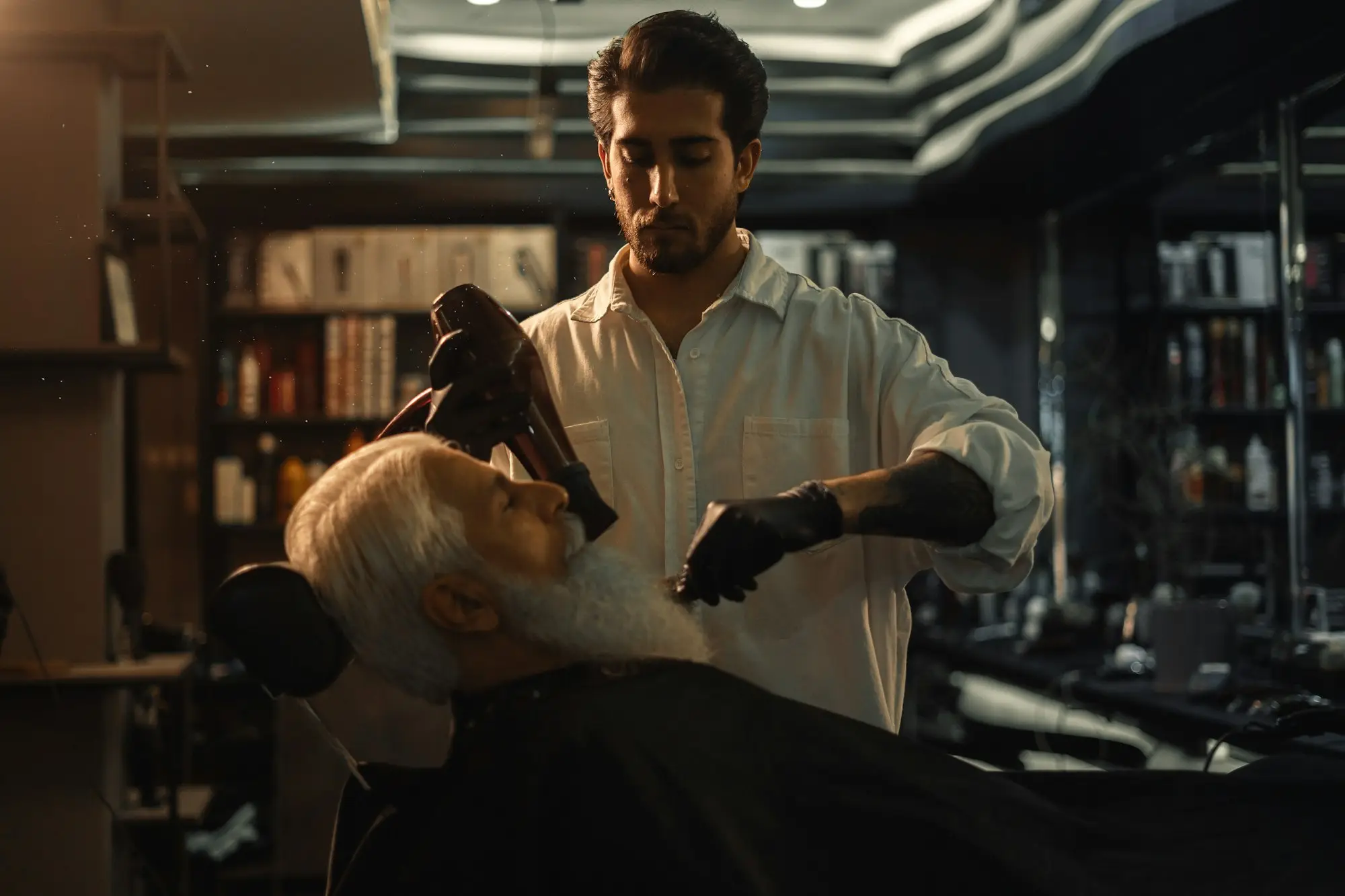 Barber cutting a client's hair
