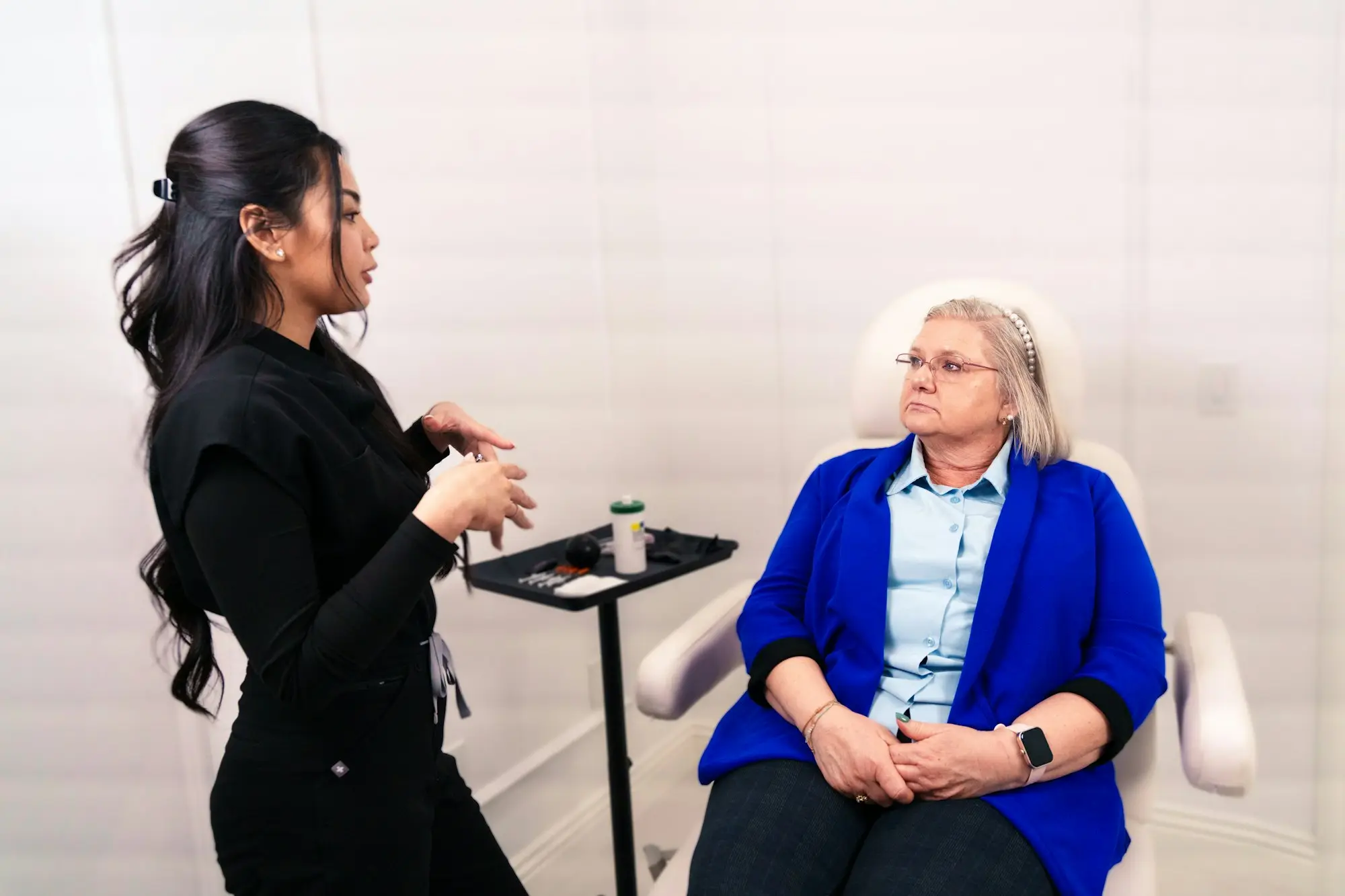Practitioner consulting a client in a clinic