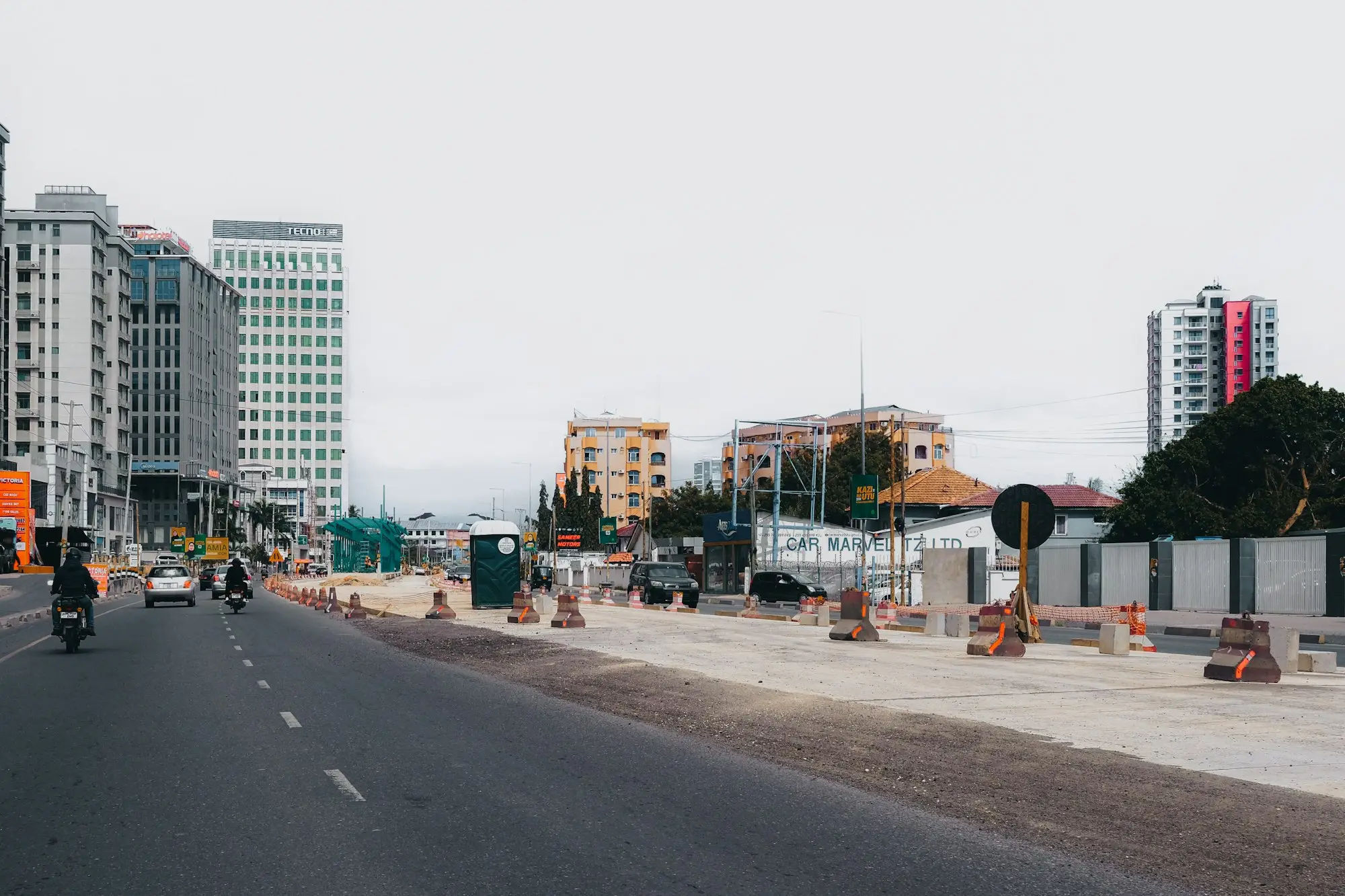 Street with roadworks outside the shops